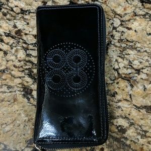 Navy blue patent leather wallet from Coach